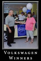 March of Dimes & Jim Ellis Volkswagen present a new Beetle to the winning family.  17 June 2006