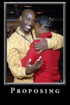 A young gentleman proposes during the Peach Drop 2008 Celebration at Underground Atlanta