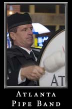 The Atlanta Pipe Band performs on St. Patrick's Day at Underground Atlanta.